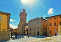 TUSCANY, AREZZO. tourists on the stairs in front of medieval San Pietro and Donato historical cathedral with facade of