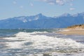 Tuscany deserted sand beach and mountains landscape Royalty Free Stock Photo