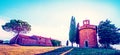 Tuscany, Italy, May, 2017: Magic landscape with chapel of Madonna di Vitaleta on a sunny day in San Quirico d`Orcia Val d`Orcia Royalty Free Stock Photo