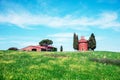 Tuscany, Italy, May, 2017: Magic landscape with chapel of Madonna di Vitaleta on a sunny day in San Quirico d`Orcia Val d`Orcia Royalty Free Stock Photo