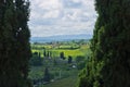 Tuscany landscape framed by two huge cypress trees, near San Gimignano Royalty Free Stock Photo