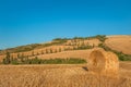 Tuscany landscape with hay bales in the field, Italy Royalty Free Stock Photo