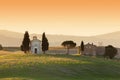 Tuscany landscape at sunrise with a little chapel of Madonna di Vitaleta, Italy. Royalty Free Stock Photo