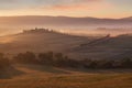 Tuscany landscape at sunrise. Typical for the region tuscan farmhouse, hills, vineyard. Italy Fresh Green tuscany landscape Royalty Free Stock Photo