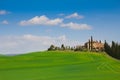 Tuscany landscape with typical farm house Royalty Free Stock Photo