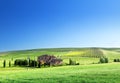 Tuscany landscape with typical farm house Royalty Free Stock Photo