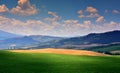 Tuscany rural sunset landscape, green field. Royalty Free Stock Photo