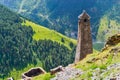 Tusheti, Georgia: an ancient tower in an alpine village Kvavlo with a breathtaking aerial view of mountains and forests