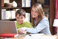 Tutor Helping Boy Studying At Home Royalty Free Stock Photo