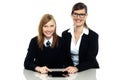 Tutor and student duo operating tablet pc