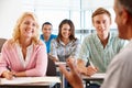 Tutor teaching class of students Royalty Free Stock Photo