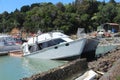 2022 Tutukaka boats in marina destroyed by tsunami from Tonga. Royalty Free Stock Photo