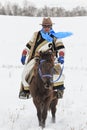 Tuva man competing in a horse race competition in the Altai mountains in China