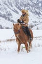 Tuva man competing in a horse race competition in the Altai mountains in China