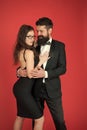 Tuxedo and dress. Formal couple. art experts of bearded man and woman. esthete. Romantic relationship. Couple in love on