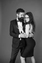 Tuxedo and dress. Formal couple. art experts of bearded man and woman. esthete. Romantic relationship. Couple in love on