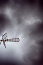 TV antenna on the roof. Low angle view. Cloudy day, gray sky Royalty Free Stock Photo