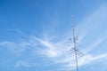 TV antenne with blue sky. Royalty Free Stock Photo