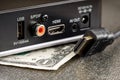 TV box with a disconnected hdmi cable and a dollar under it Royalty Free Stock Photo