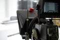 TV camera in the Studio. Teleprompter and professional high-definition video camera on a tripod.