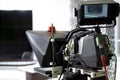 TV camera in the Studio. Teleprompter and professional high-definition video camera on a tripod.