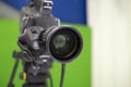 TV camera in the Studio. Teleprompter and professional high-definition video camera on a tripod