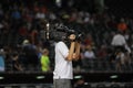 A TV cameraman shooting a Baseball game Royalty Free Stock Photo