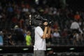 A TV cameraman shooting a Baseball game