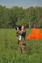 A TV cameraman takes pictures during an exercise at the training ground