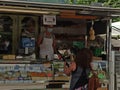 A TV crew camerawoman interviewing a female vendor at the Friday Market in Merano, South Tirol, Italy on May, 22, 2020.