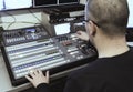 TV editor working with audio video mixer in a television broadcast Royalty Free Stock Photo