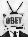 TV head with message OBEY