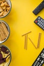 TV inscription, snacks and remote controls