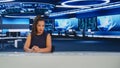 TV Live News Program with Professional Female Presenter Reporting. Television Cable Channel