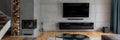 Tv room with cement wall Royalty Free Stock Photo