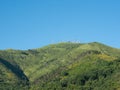 TV mast and telecommunication antennas on top of a mountain Royalty Free Stock Photo