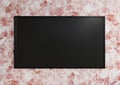 Tv mockup on red white marble wall.3d rendering Royalty Free Stock Photo