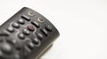 TV remote control with focus on and off button Royalty Free Stock Photo