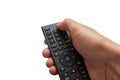 TV remote control in hands isolated,turning on the TV from the remote control, hands holding the remote control on a white Royalty Free Stock Photo