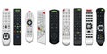 Tv remote controls with buttons in different designs. Wireless power media device to switch channel programmes remotely Royalty Free Stock Photo