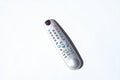 Tv remote on a white background. Photo with shadows, hard light. Top View.