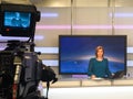 TV reporter at the news desk Royalty Free Stock Photo