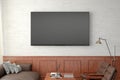 TV screen mockup on the white wall with classic wooden decoration  in living room. Front view, clipping path around screen Royalty Free Stock Photo