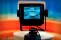 Close-up shot of a video camera viewfinder, recording show in a TV studio Royalty Free Stock Photo