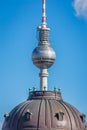 TV tower above baroque dome of baroque building, Berlin, Germany