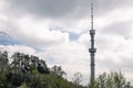 TV tower against the background of a cloudy sky. Koktobe Television and radio broadcast tower in Almaty, Kazakhstan. Royalty Free Stock Photo