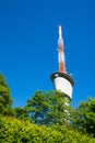 TV Tower on Blue Sky Green Trees Sunny Summer Wireless Communication Technology Engineering Architecture Royalty Free Stock Photo