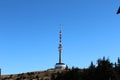Tv tower and lookout tower on the top of the mountain