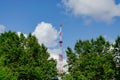 TV tower. Repeater. Green trees Royalty Free Stock Photo