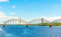 TV tower in Riga behind a steel railway bridge, Latvia...IMAGE Royalty Free Stock Photo